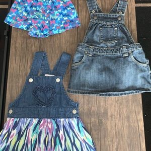 4 denim overalls for baby girls. Size 9 months.